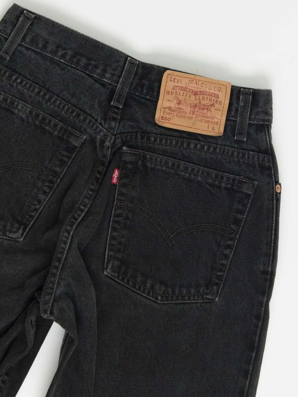 Vintage Levis 550 womens jeans 27 x 31 black dark wash 90s